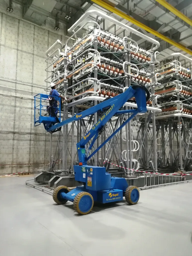 Overhead busbar installation from an articulating boom lift